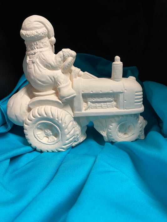 Santa Riding a Tractor Ceramic Bisque