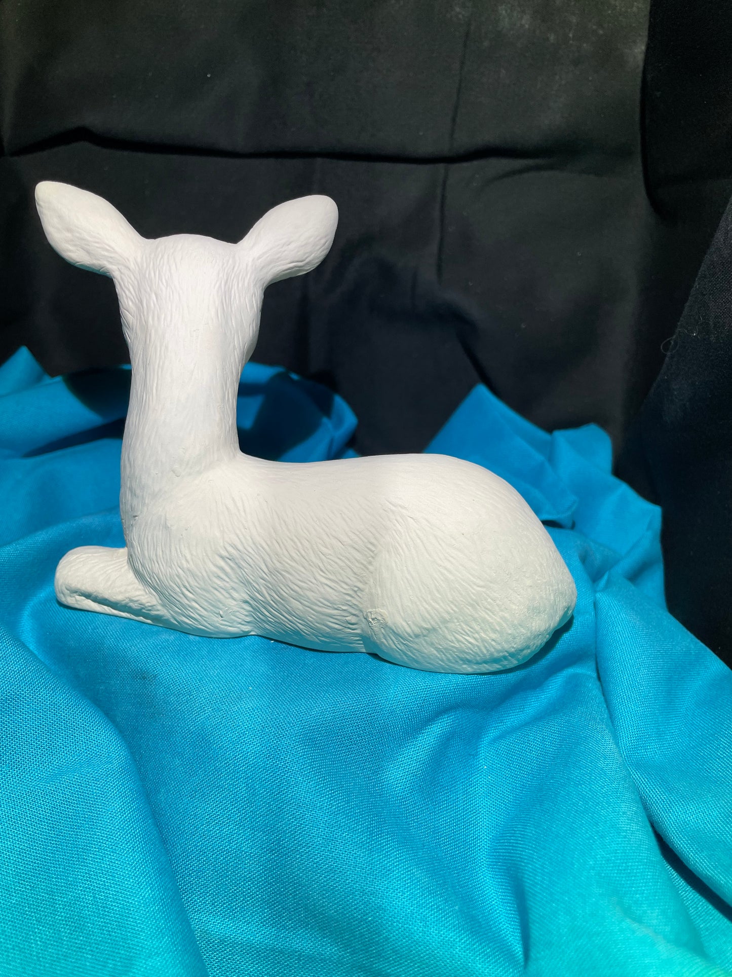 Small Laying Deer Facing Right Ceramic Bisque
